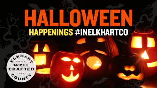 Illuminated carved pumpkins with spooky faces, promoting Halloween events in Elkhart County, Indiana.